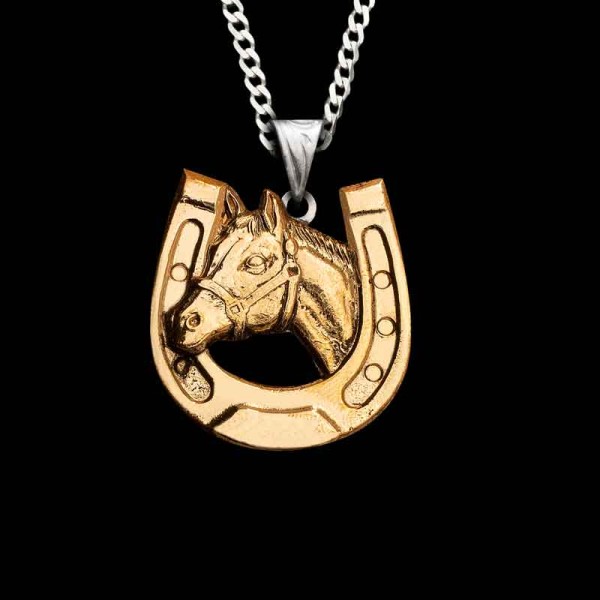 Lucky you, this Mare Pendant is customizable and crafted in Jeweler’s Bronze – a perfect piece to start a collection with! The horse-shoe element creates a beautiful shape to wear around your neck. 1.5""x1.5""